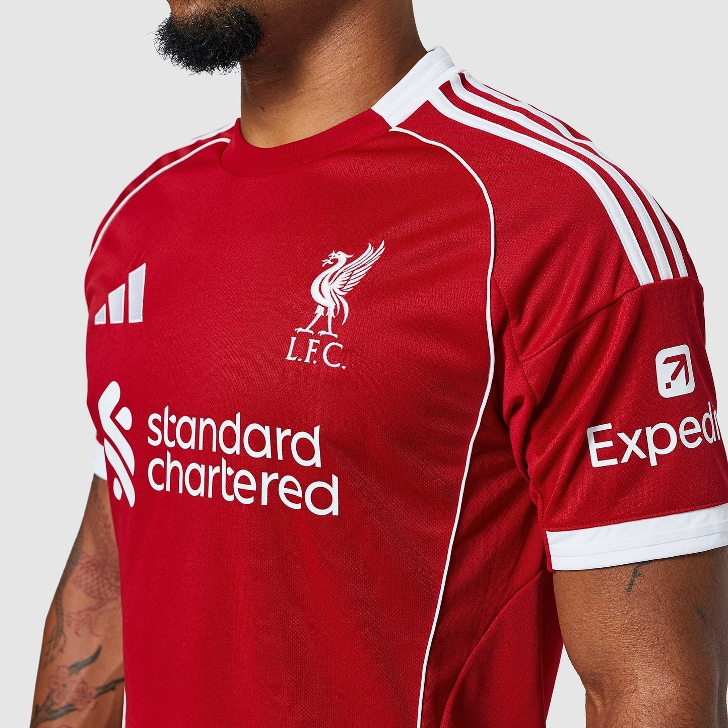 Liverpool 25/26 Home Jersey - crest and chest detail