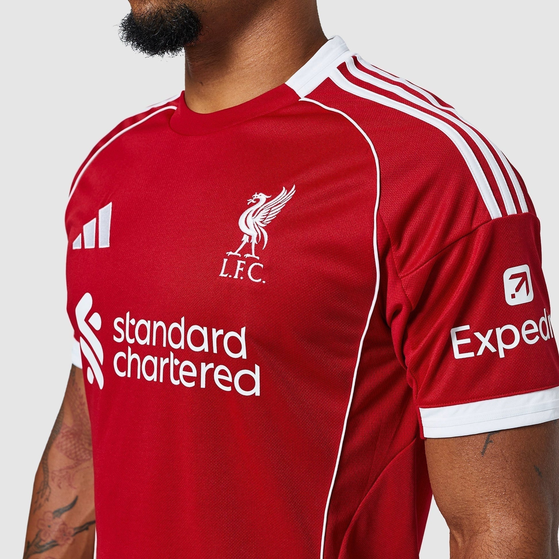 Liverpool 25/26 Home Jersey - crest and chest detail