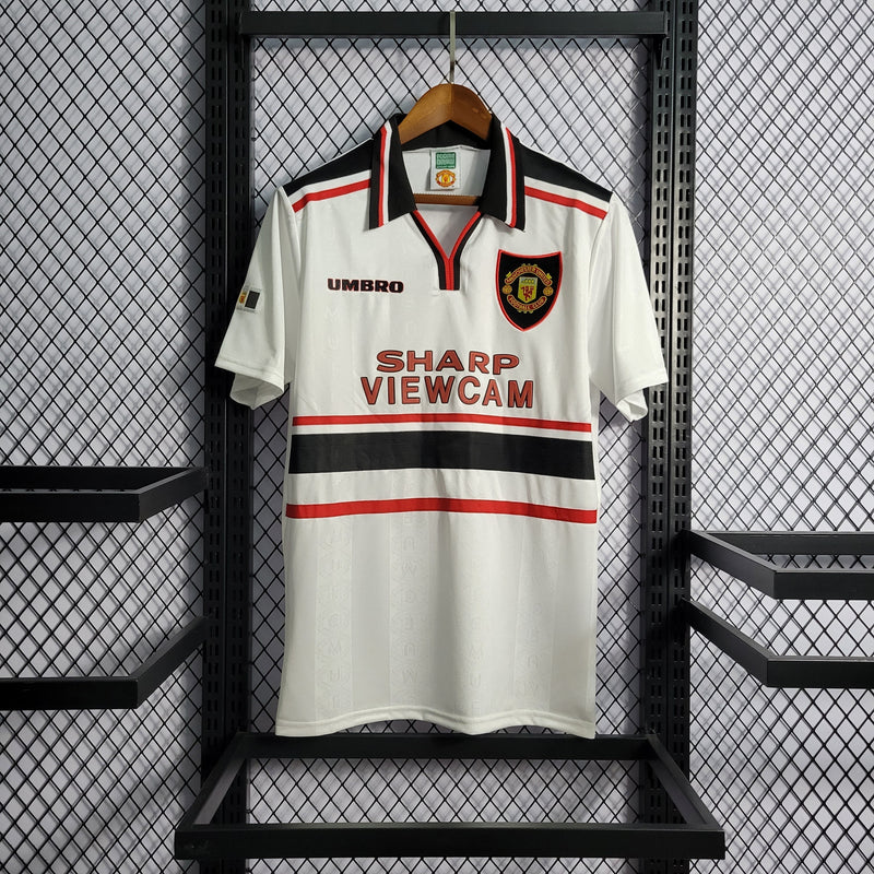 Imagem do produto Camisa Manchester United Reserva 97/99 - Versão Retro com entrega para brasileiros no Reino Unido