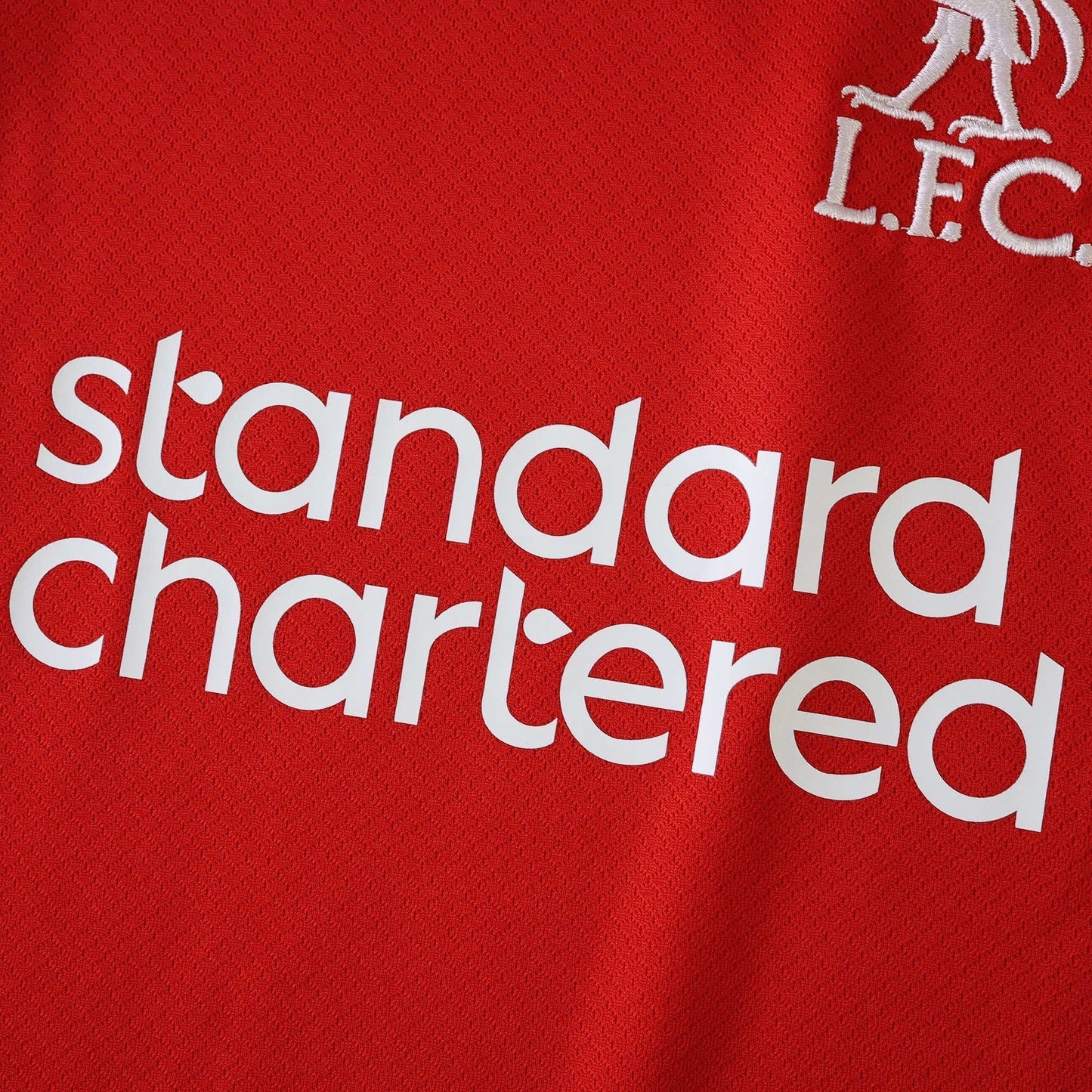 Liverpool 25/26 Home Kids Kit - Standard Chartered sponsor detail