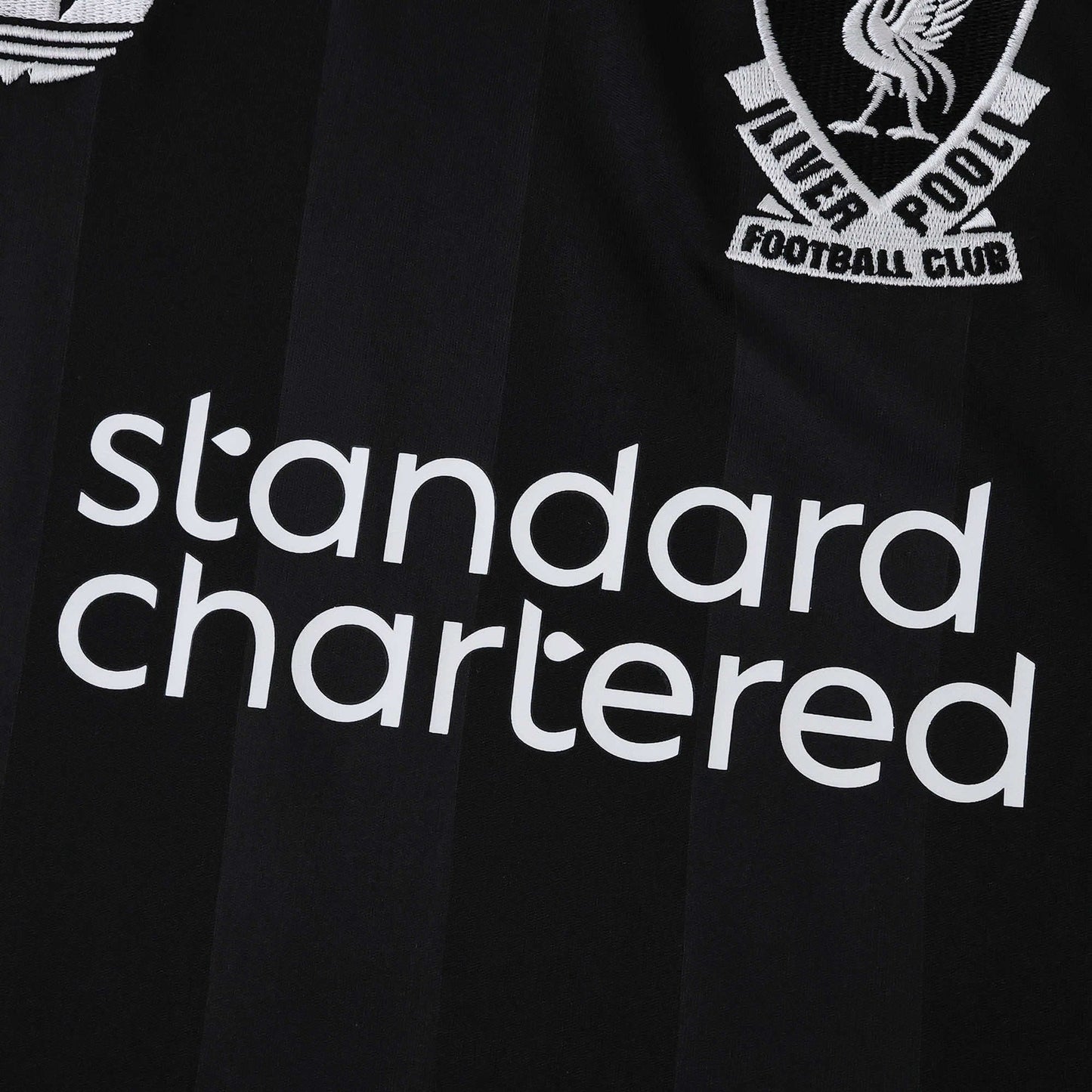 Liverpool 25/26 Goalkeeper Black Jersey - Standard Chartered sponsor detail