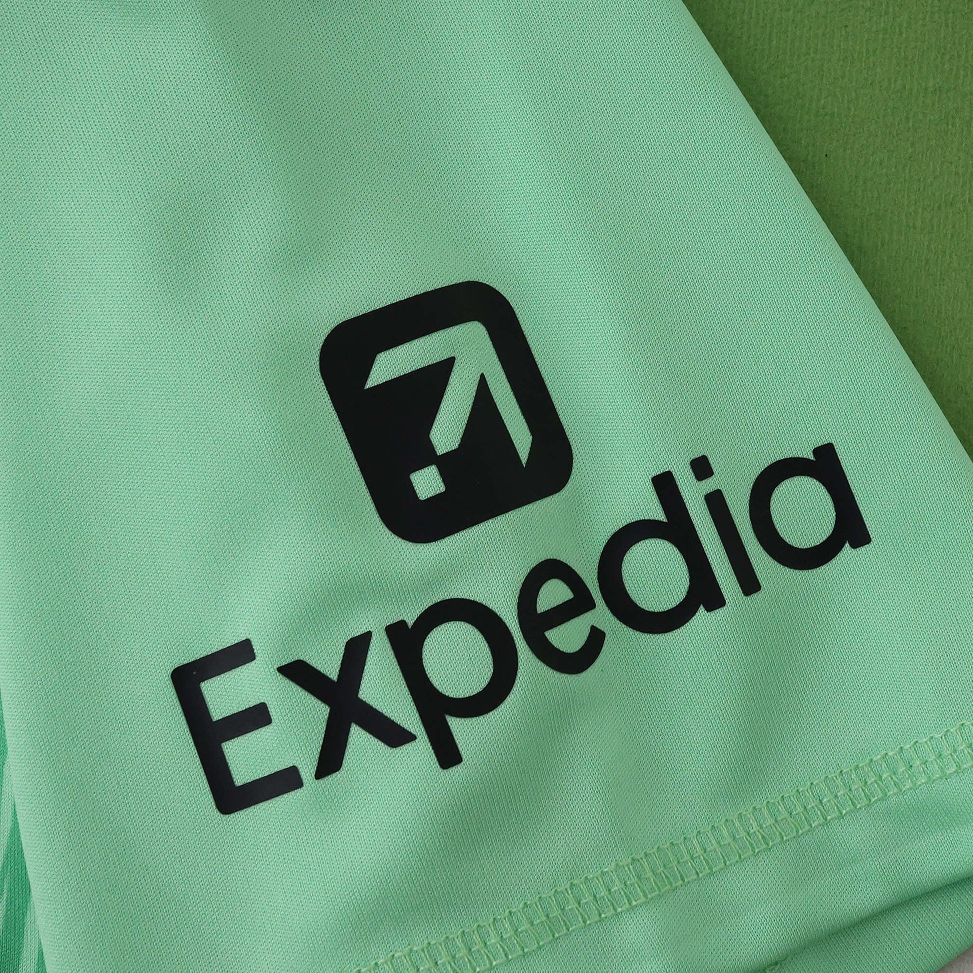 Liverpool 25/26 Goalkeeper Green Jersey - Expedia sleeve sponsor detail