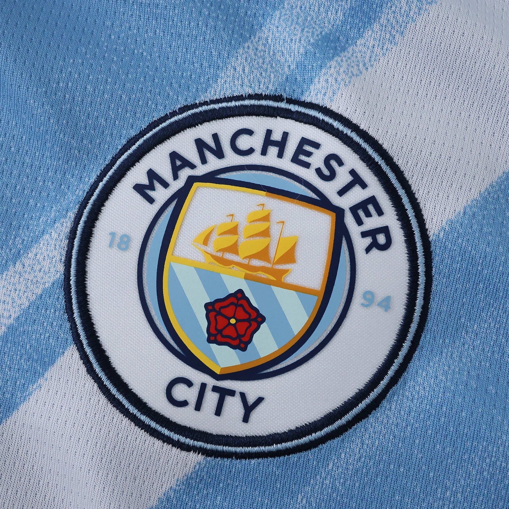 Manchester City 25/26 Home Jersey - crest detail