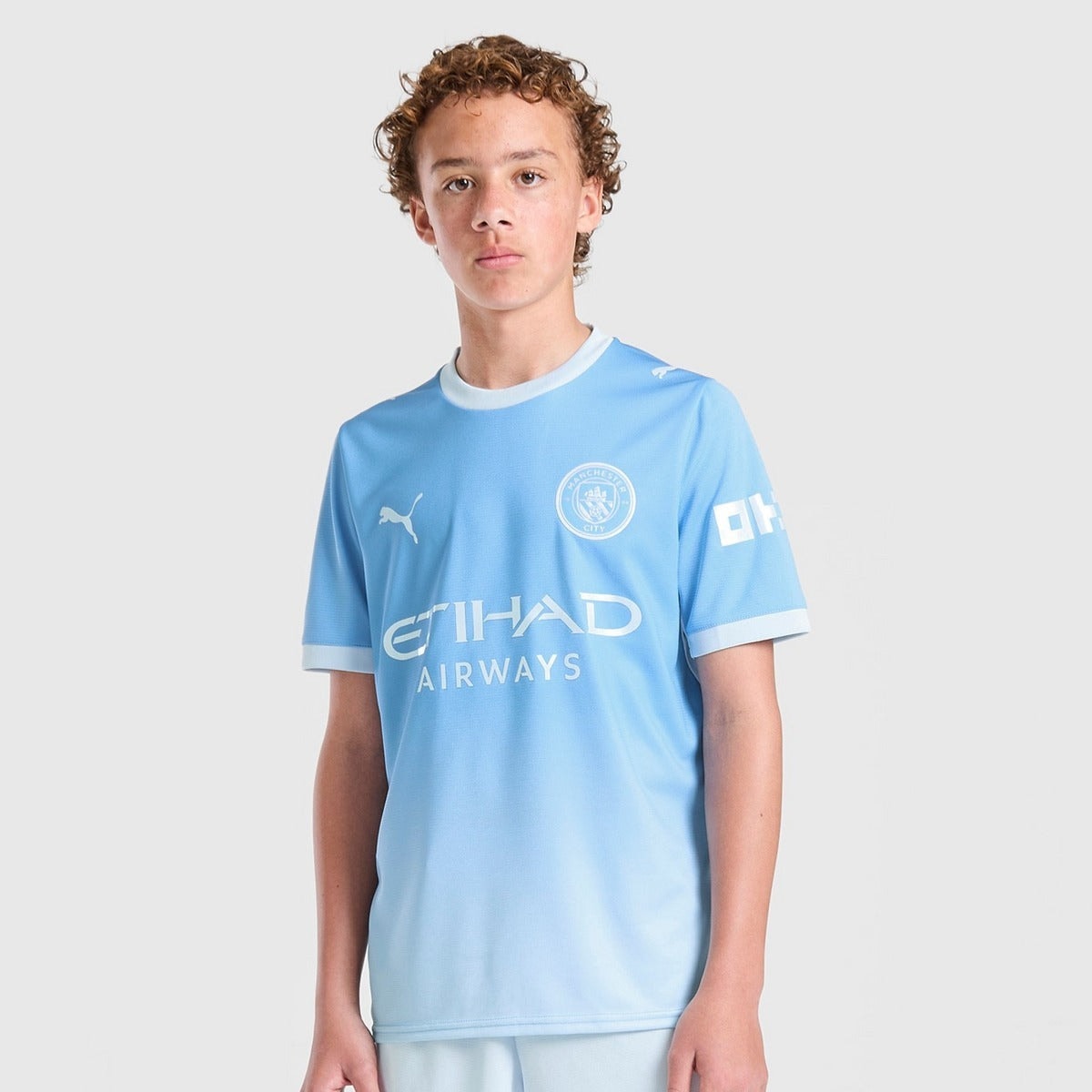 Manchester City 26/27 Home Kids Kit - worn by model front