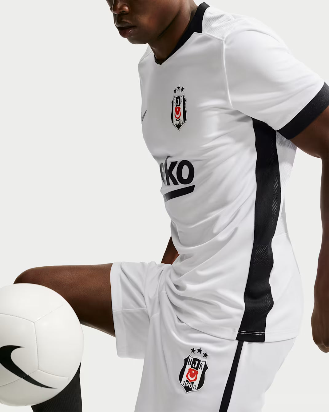 Besiktas 26/27 Home Jersey - worn by model with ball