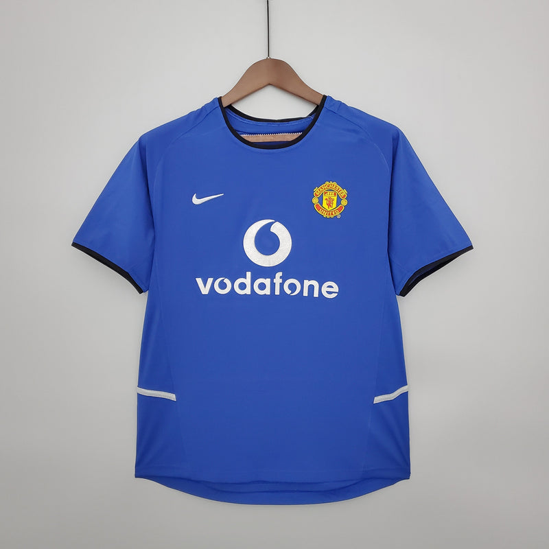 Imagem do produto Camisa Manchester United Reserva 02/04 - Versão Retro com entrega para brasileiros no Reino Unido