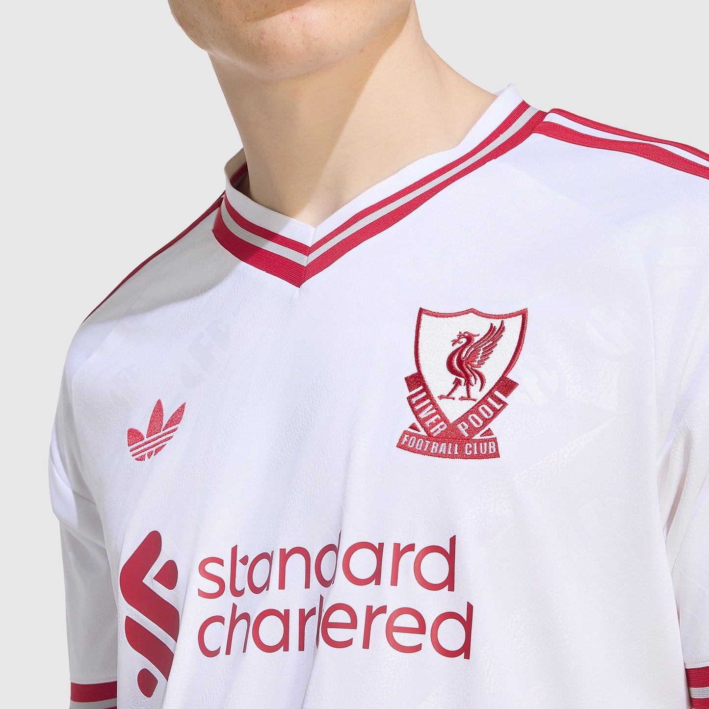 Liverpool 26/27 Away Jersey - crest and collar detail