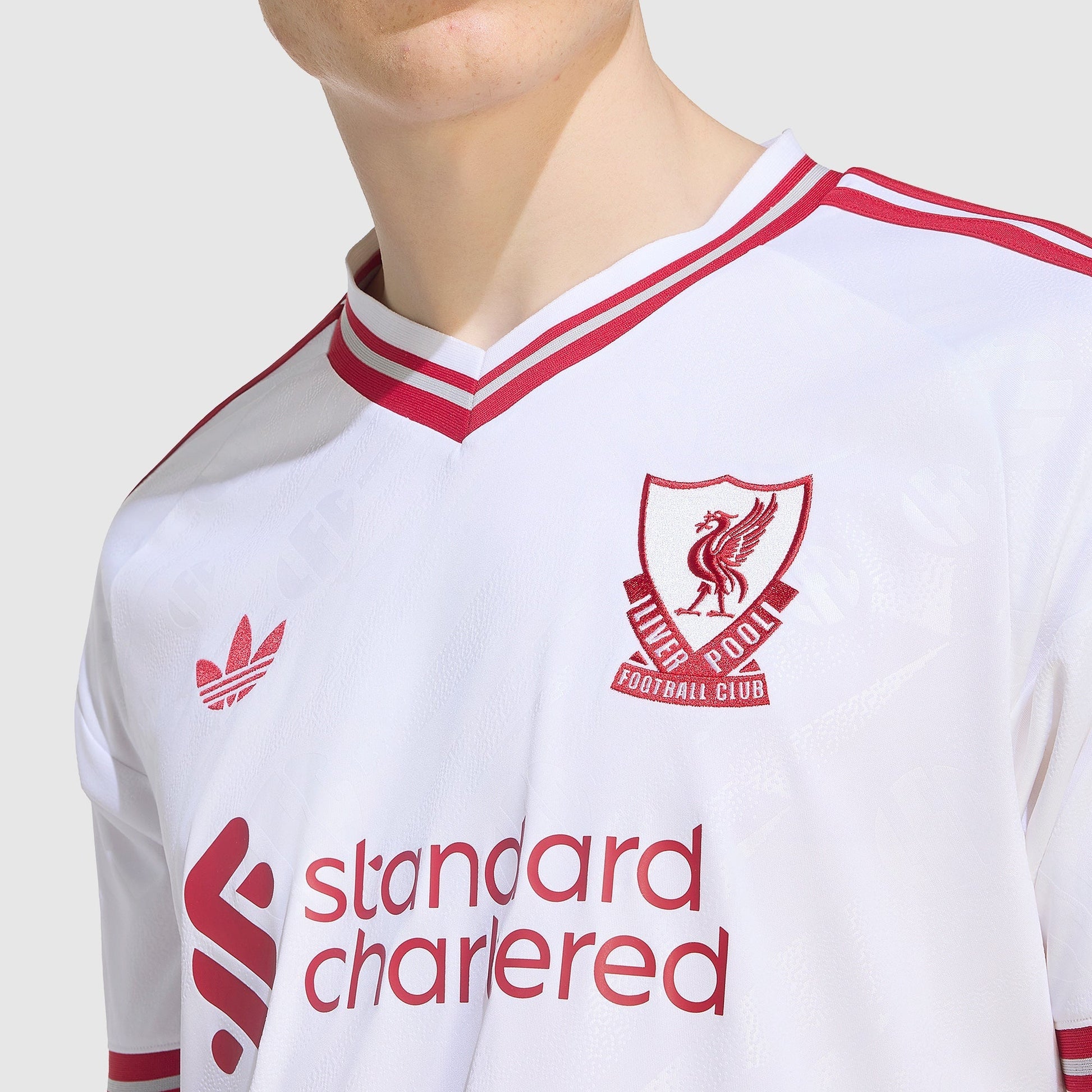 Liverpool 26/27 Away Jersey - crest and collar detail